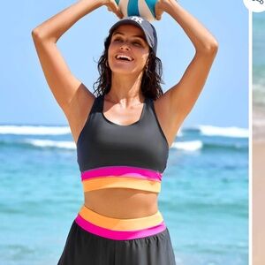 Vibrant Black Athletic Shorts and Top with Orange and Magenta Waistband